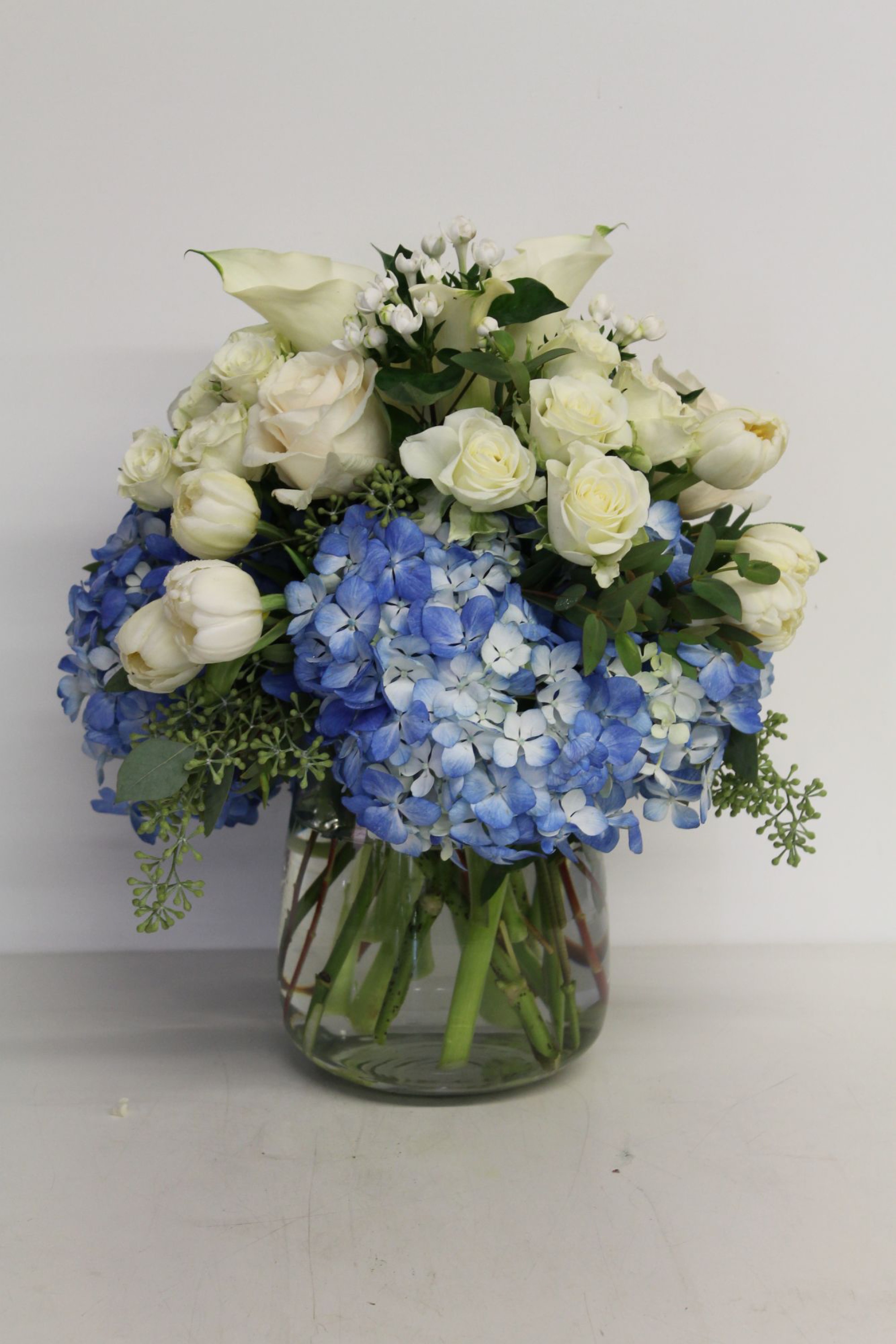 Seaside — calla lilies arrangement, hand-composed in The Flower Lover atelier in Huntington Beach